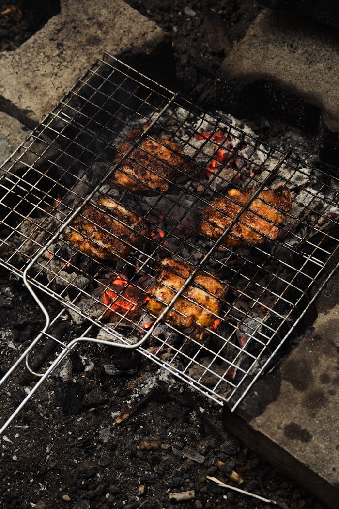 Grilled Chicken on Charcoal Barbecue Outdoors